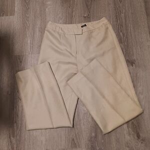 Business casual tan/cream dress pants. 100% polyester. Lined. Size 8 office